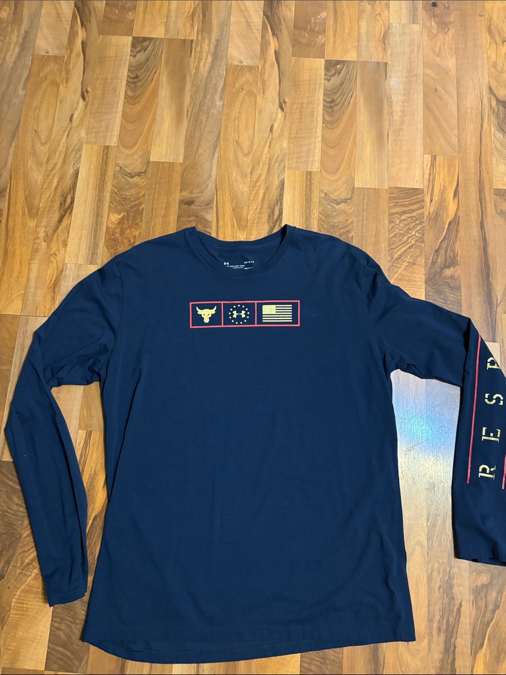 Under Armour Men’s Navy Long Sleeve Graphic Tee with Red & Yellow Accents